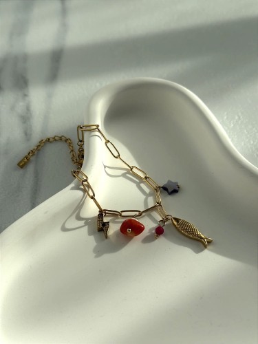 vBransoletka złota z zawieszkami morskimi, rybka, niebieska gwiazdka, pomarańczowy kamień i błyskawica z cyrkonią, stal szlachetna pozłacana, zapinana